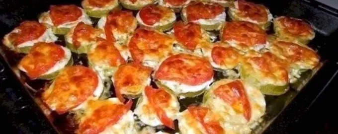 Кабачки запечённые с помидорами в духовке