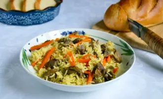 Плов с куриными желудками